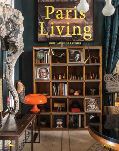Book titled "Paris Living" displayed on a shelf in a decorated room.