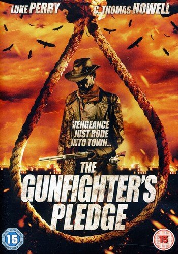 DVD cover for "Gunfighter's Pledge" featuring a cowboy with a rifle.