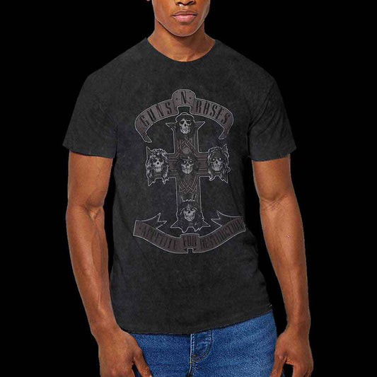 Person wearing a black Guns N' Roses t-shirt with a monochrome cross graphic.