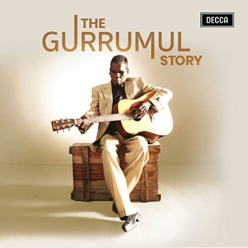 Album cover for “The Gurrumul Story” featuring Geoffrey Gurrumul Yunupingu with guitar.