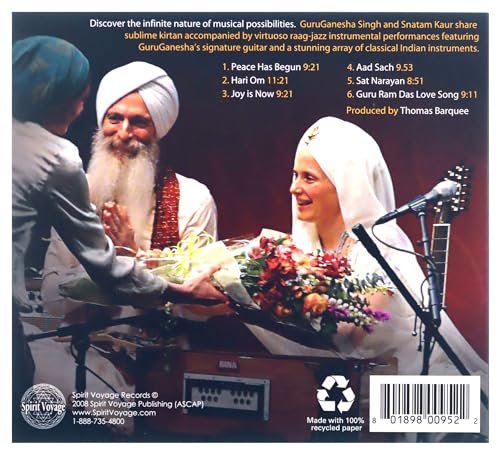 Back cover of Joy Is Now CD featuring GuruGanesha Singh and Snatam Kaur with tracklist.