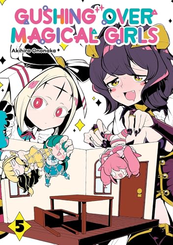 Two anime-style girls playing with small character figurines in a miniature room setting.
