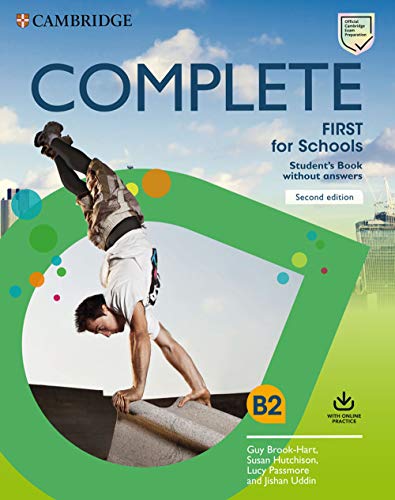 Textbook cover showing a person doing a handstand against a blue sky background.