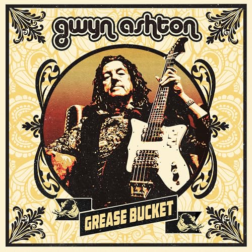 CD cover for Gwyn Ashton's "Grease Bucket" featuring a guitarist.