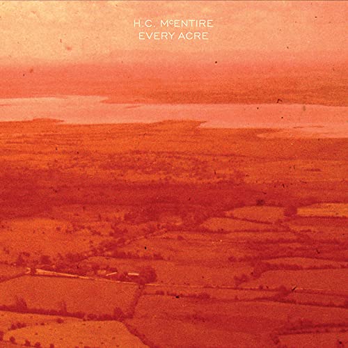 CD cover for H.c. Mcentire’s “Every Acre” with an aerial landscape.