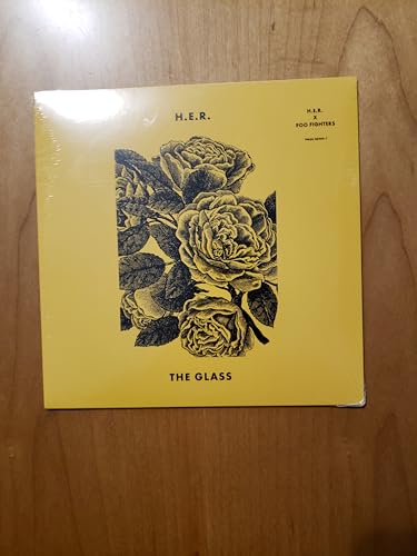 Yellow vinyl record cover featuring a black and white illustration of roses.
