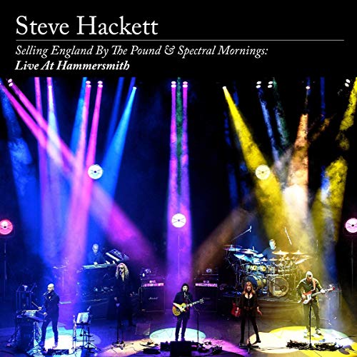 Steve Hackett live band performing on a stage with bright lights.