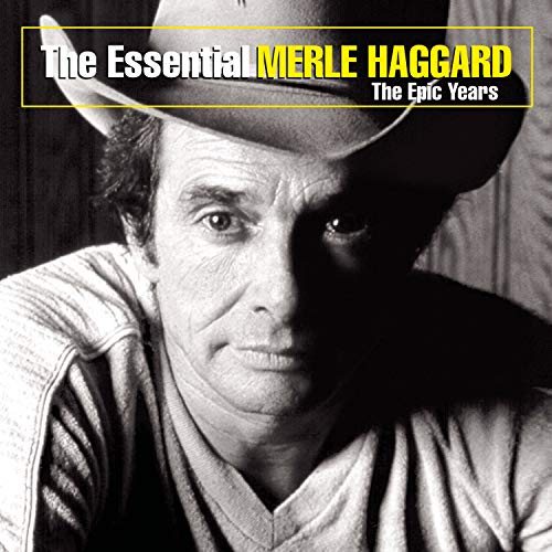 Black and white portrait of Merle Haggard wearing a cowboy hat and V-neck shirt.
