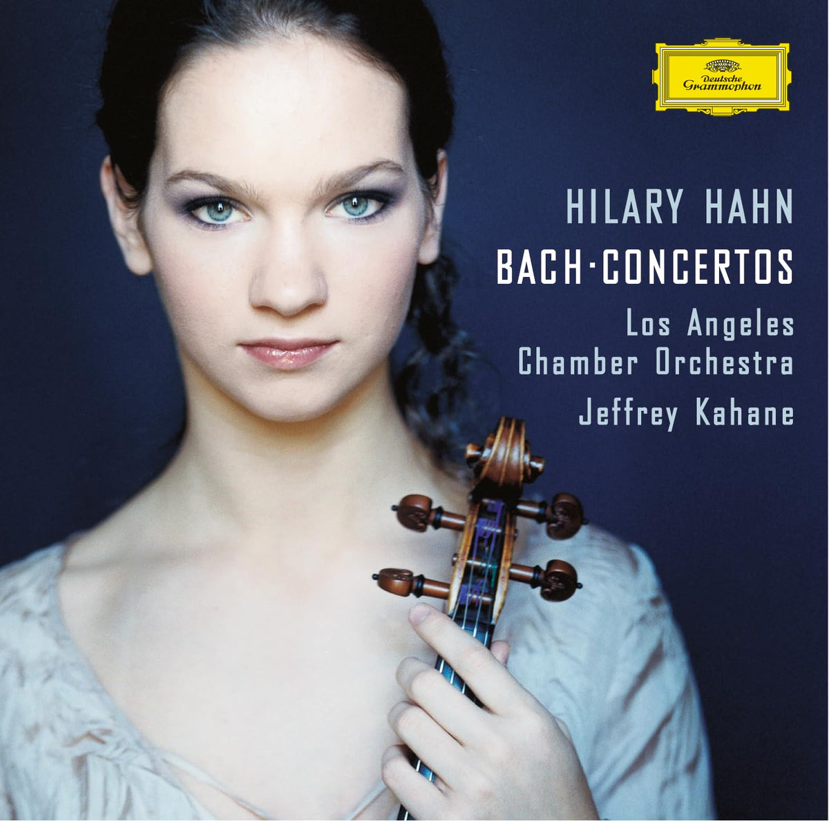 Hilary Hahn portrait with violin, album cover for Bach concertos vinyl.