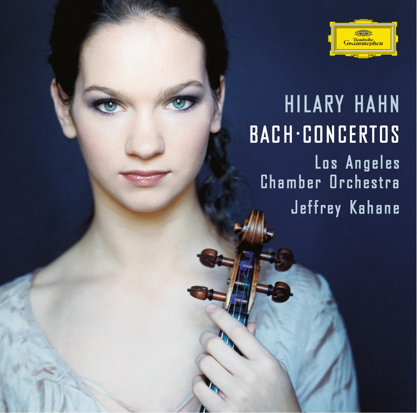 Hilary Hahn portrait with violin, album cover for Bach concertos vinyl.