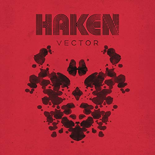 Haken’s “Vector” CD cover: red background with dark inkblot face and band name.