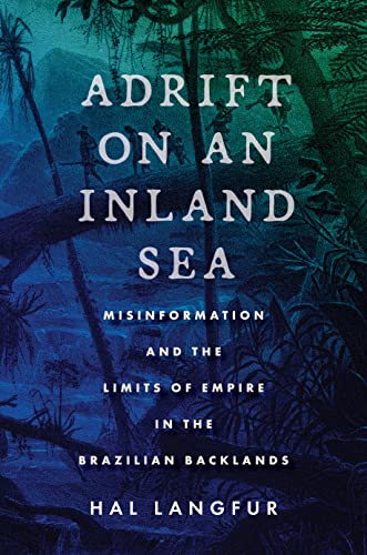 Book cover: dark blue and green foliage with white title text.