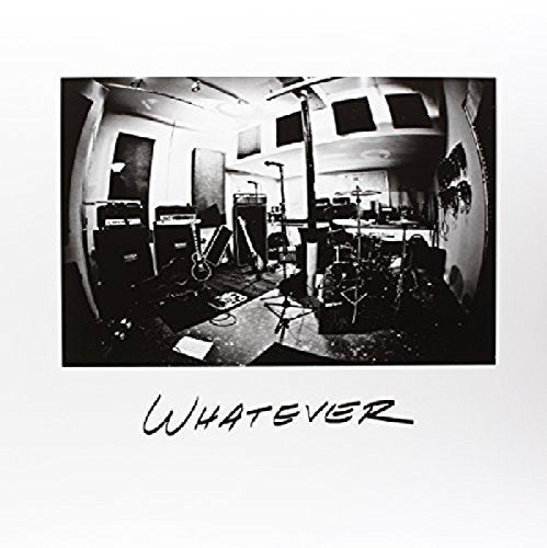 Black and white photo of a music studio with instruments, text "WHATEVER".