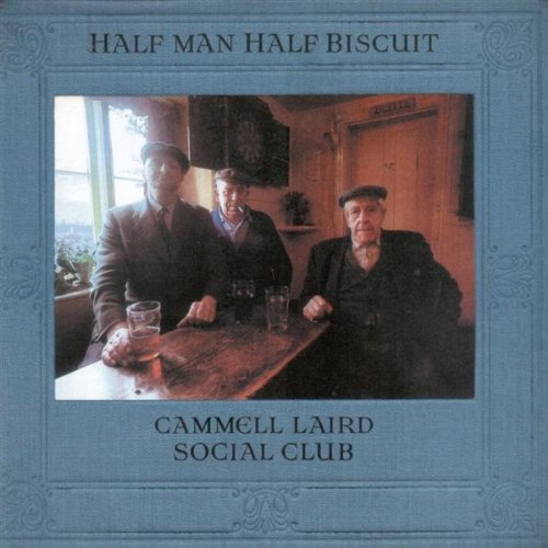 CD cover: three men in suits sit at a table with drinks.