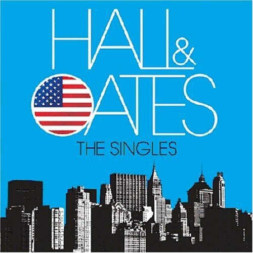 Daryl Hall & John Oates album cover with city skyline and US flag.