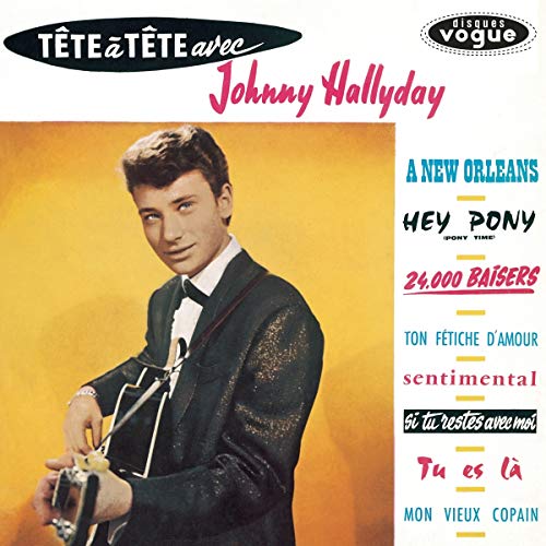 Johnny Hallyday vinyl record cover, portrait of a young man with guitar.