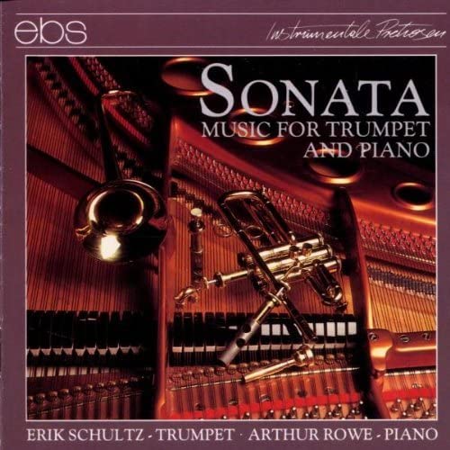 CD cover featuring a trumpet and piano keys in warm tones.