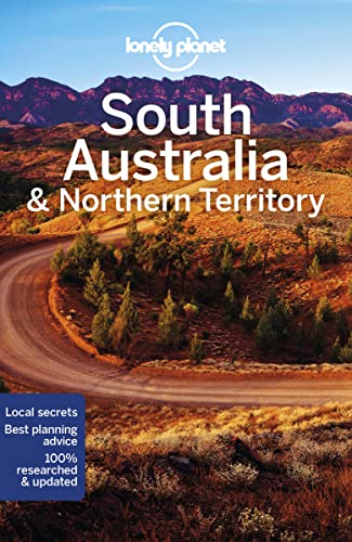 Lonely Planet travel guide cover featuring a winding dirt road through an Australian landscape.
