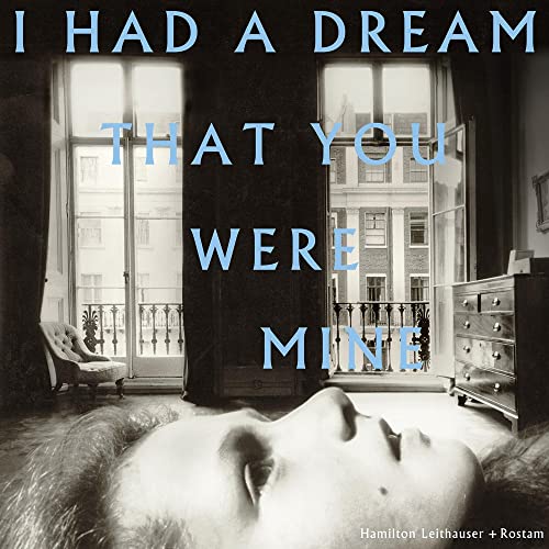Album cover: a person lying down, looking at a window with text overlay.