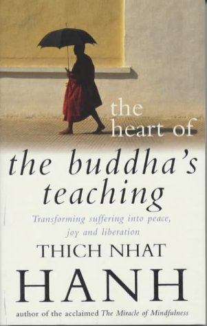 Book cover with monk walking under umbrella, title, and author name "Thich Nhat Hanh" displayed.