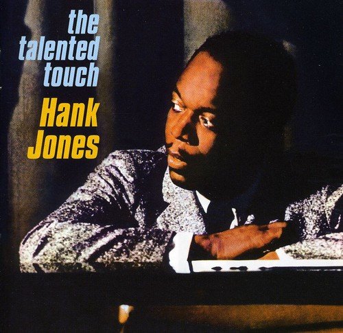 "Album cover featuring Hank Jones at a piano, wearing a sparkly jacket."