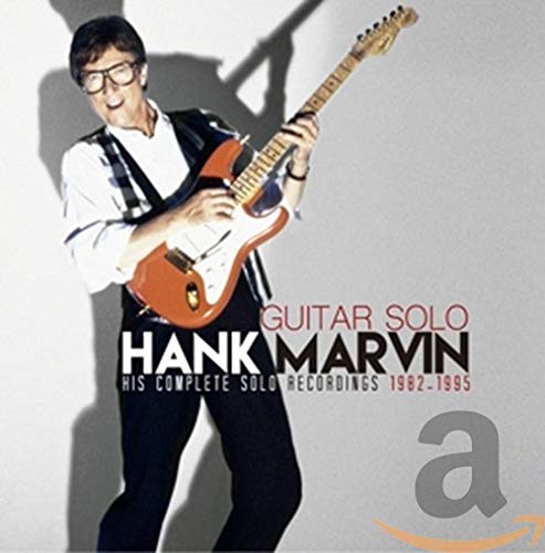 Hank Marvin playing an orange electric guitar, album cover image.