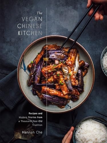 Cookbook cover featuring a bowl of stir-fried eggplant being picked up with black chopsticks.