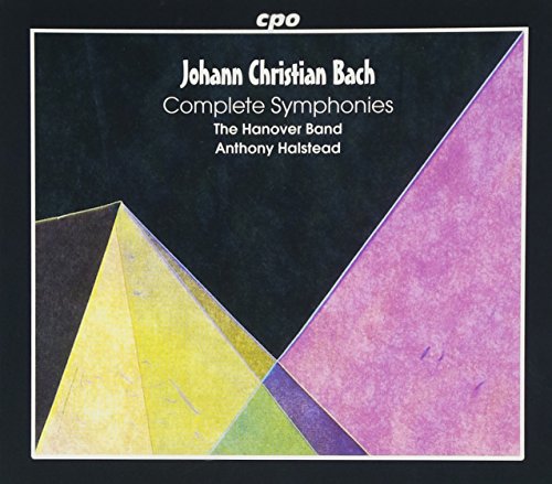 CD cover with abstract geometric shapes in pastel colors on a dark background.