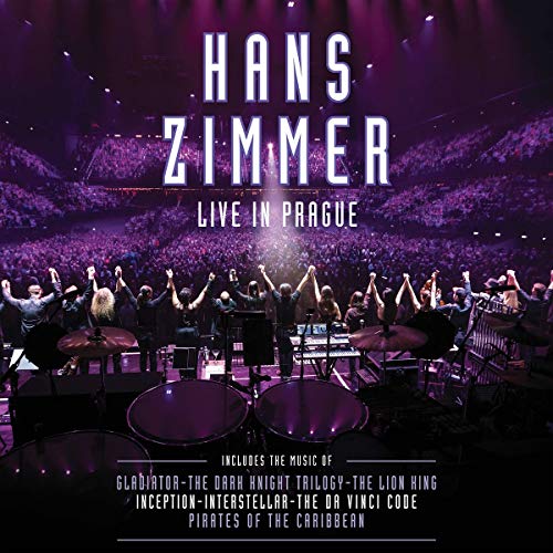 Hans Zimmer Live In Prague album cover with orchestra and audience.