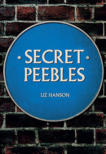 Blue plaque reading "Secret Peebles" against a brick wall.