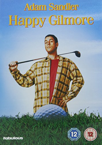 Adam Sandler stands in grass holding a golf club behind a giant golf ball.