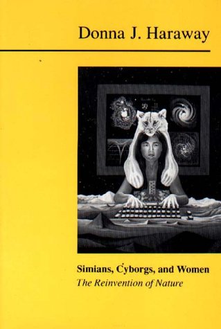 Book cover: woman with animal head, keyboard, and galactic imagery.