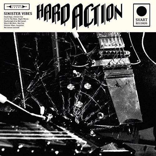 "Black and white album cover with smashed guitar and 'Hard Action' title."