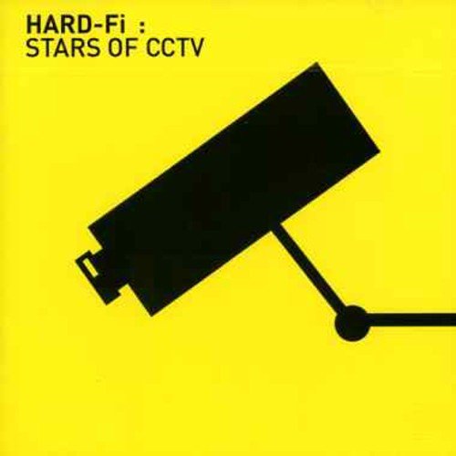 Yellow album cover with a black silhouette of a security camera.
