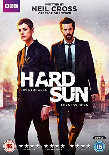 "DVD cover for 'Hard Sun' featuring two men in suits against a cityscape."