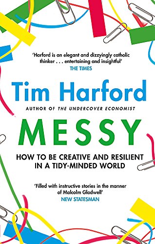 Book cover with colorful office supplies scattered around bold green text.