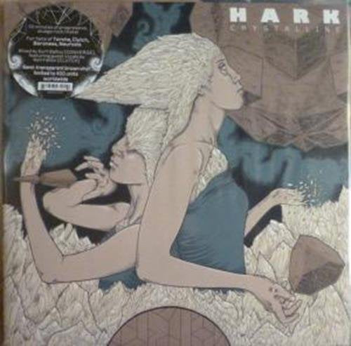 Vinyl record cover featuring two figures in a surreal, textured landscape.