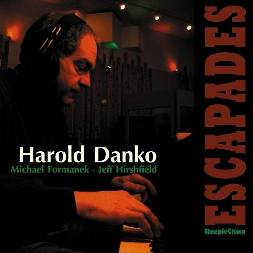 "Album cover: man wearing headphones playing piano, with 'ESCAPADES' written vertically on the right."
