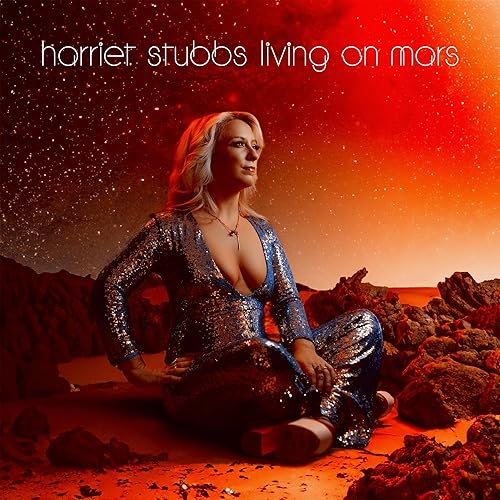 Album cover for Harriet Stubbs' “Living On Mars” featuring a woman in a sparkly suit.