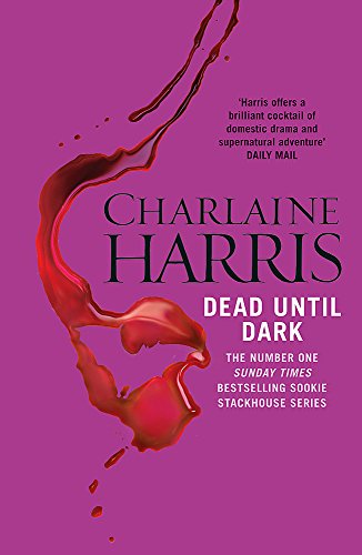Book cover for Dead Until Dark by Charlaine Harris with a red liquid splash.