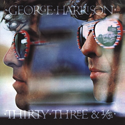 George Harrison wearing red, white, and blue sunglasses on the album cover.