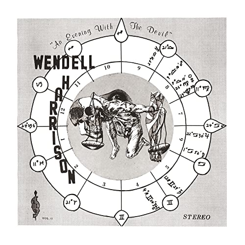 Vinyl record cover: black and white illustration of scales and a figure.