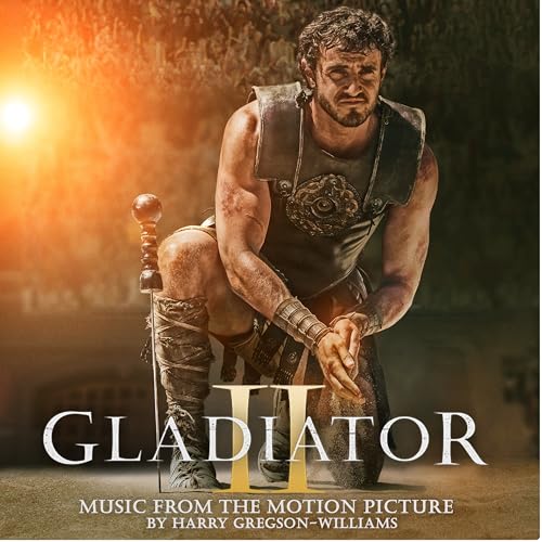 Gladiator II vinyl cover featuring a muscular warrior and bold title text.
