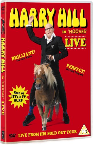 Harry Hill in a suit and glasses riding a pony on a red background.