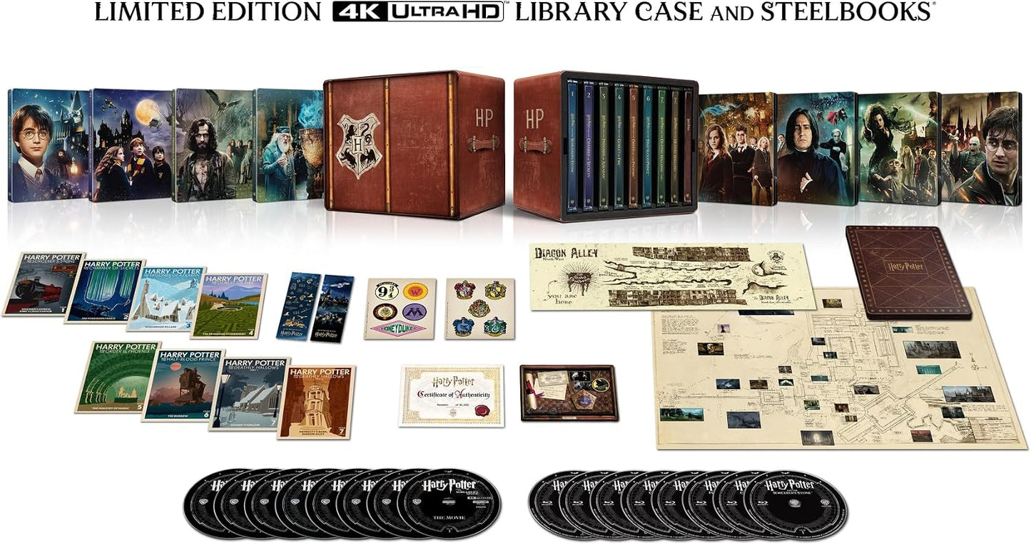 Harry Potter 4K UHD SteelBook collection with case, discs, and memorabilia.