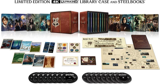 Harry Potter 4K UHD SteelBook collection with case, discs, and memorabilia.