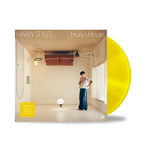 Harry Styles album cover with man standing in room and yellow vinyl record.