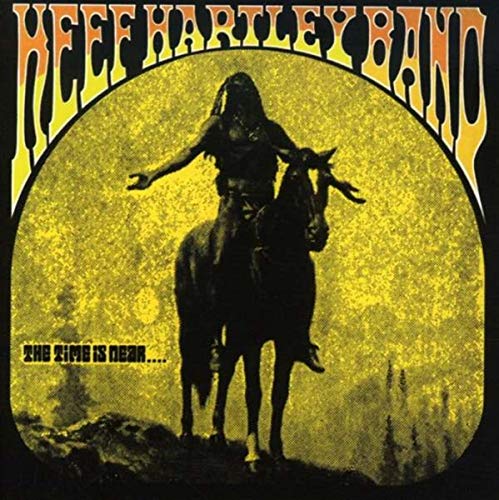 Album cover art showing a silhouette of a person on horseback against a yellow moon.