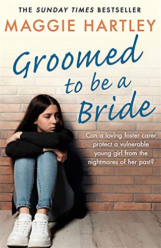 Book cover: young woman sits against a brick wall, looking distressed.