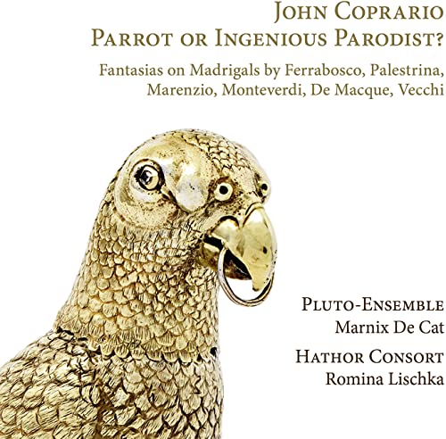 Golden automaton parrot with a metal ring in its beak.